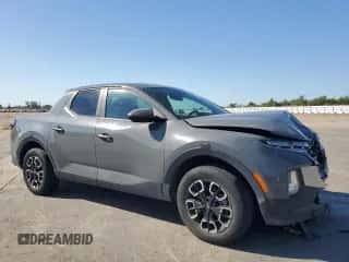 2022 Hyundai Santa Cruz SEL z VIN 5NTJBDAE8NH022419, wystawiony jako Copart lot #72043705 z przebiegiem 38 009 mil mil oraz Szkoda całkowita • Salvage title. Historia ofert i sprzedaży dostępna na DreamBid. Obrazek 4.