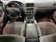 2004 Ford Explorer XLT z VIN 1FMDU83K04ZA05097, wystawiony jako Copart lot #88507065 z przebiegiem 229 920 mil mil oraz Szkoda całkowita • Salvage title. Historia ofert i sprzedaży dostępna na DreamBid. Obrazek 8.