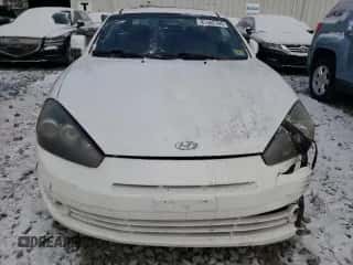 2008 Hyundai Tiburon GT с VIN KMHHN66F68U269896, выставлен на аукционе Copart как лот 87502765 с пробегом 196 437 миль миль и Списание • Salvage title. История ставок и продаж доступна на DreamBid. Изображение 5.