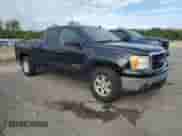 2007 GMC Sierra 1500 Work Truck with VIN 1GTEK19017E507902, listed as a Copart auction lot 80327345 with 199,805 mi miles and Salvage title. Bid and sale history available at DreamBid. Image 4.