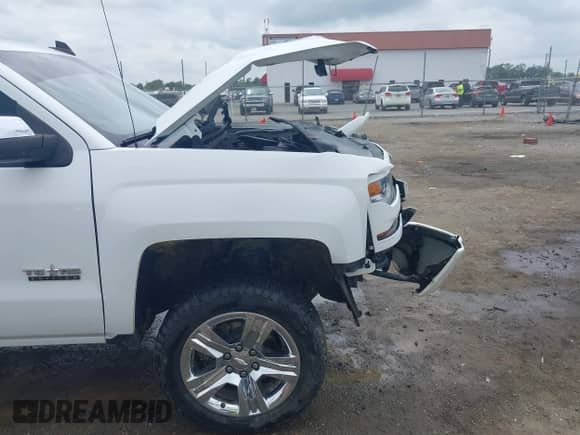 2017 Chevrolet Silverado 1500 LS with VIN 3GCUKNEC7HG274735, listed as a IAAI auction lot 39941955 with 163,567 mi miles and . Bid and sale history available at DreamBid. Image 18.