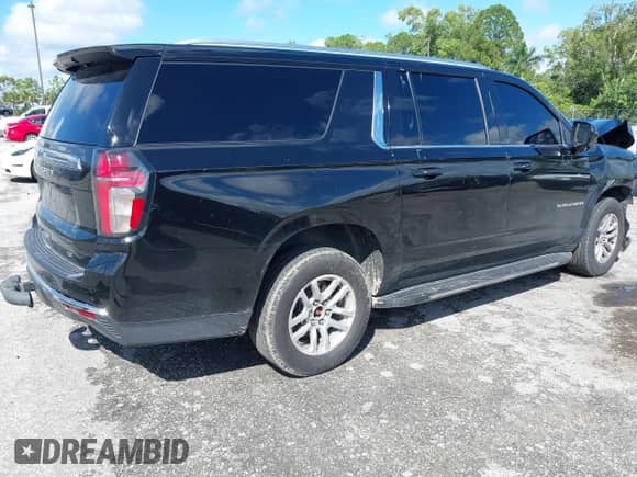2021 Chevrolet Suburban LT with VIN 1GNSCCKD1MR421283, listed as a IAAI auction lot 43396585 with 132,534 mi miles and . Bid and sale history available at DreamBid. Image 4.