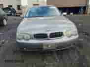 2004 BMW 7 Series 745i with VIN WBAGL63444DP71760, listed as a Copart auction lot 82377444 with 289,762 mi miles and Salvage title. Bid and sale history available at DreamBid. Image 5.