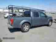 2006 Nissan Frontier SE with VIN 1N6AD07U36C427985, listed as a Copart auction lot 65688815 with 327,628 mi miles and Salvage title. Bid and sale history available at DreamBid. Image 3.