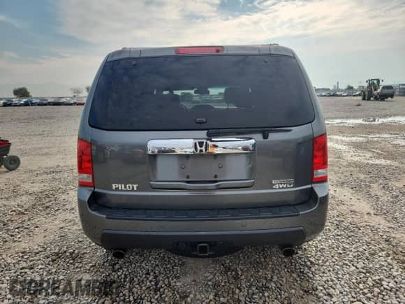 2009 Honda Pilot Touring with VIN 5FNYF48969B025883, listed as a Copart auction lot 70923065 with 192,552 mi miles and Salvage title. Bid and sale history available at DreamBid. Image 6.