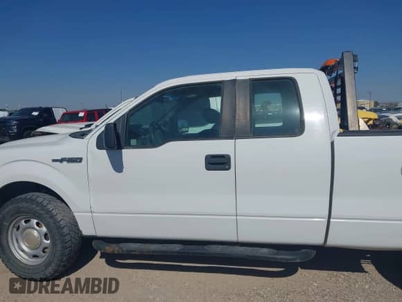 2014 Ford F-150 XL z VIN 1FTFX1EF2EKE06852, wystawiony jako IAAI lot #43059153 z przebiegiem 164 616 mil mil oraz . Historia ofert i sprzedaży dostępna na DreamBid. Obrazek 13.