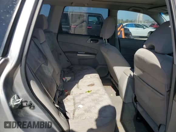 2009 Subaru Forester X z VIN JF2SH63679H729245, wystawiony jako Copart lot #86156635 z przebiegiem 182 709 mil mil oraz Szkoda całkowita • Salvage title. Historia ofert i sprzedaży dostępna na DreamBid. Obrazek 10.