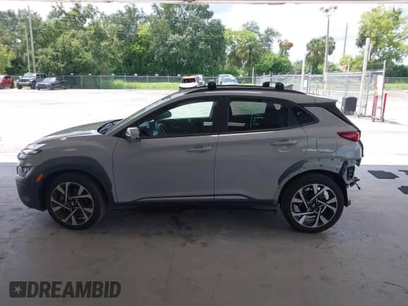 2022 Hyundai Kona Limited z VIN KM8K53A39NU770584, wystawiony jako IAAI lot #43089489 z przebiegiem 14 188 mil mil oraz . Historia ofert i sprzedaży dostępna na DreamBid. Obrazek 15.