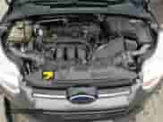 2012 Ford Focus Titanium z VIN 1FAHP3N26CL412510, wystawiony jako Copart lot #84207115 z przebiegiem 125 005 mil mil oraz Czysty tytuł • Clean title. Historia ofert i sprzedaży dostępna na DreamBid. Obrazek 11.