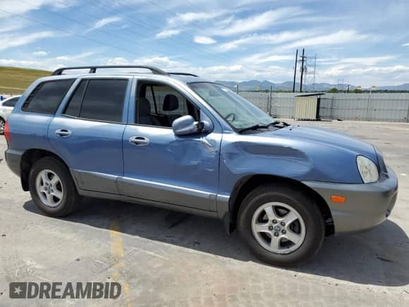 2002 Hyundai Santa Fe GLS with VIN KM8SC73D92U321050, listed as a Copart auction lot 63668945 with 142,049 mi miles and Salvage title. Bid and sale history available at DreamBid. Image 4.