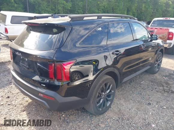2023 Kia Sorento X-Line EX with VIN 5XYRHDLF6PG218987, listed as a IAAI auction lot 42202644 with 24,475 mi miles and . Bid and sale history available at DreamBid. Image 4.
