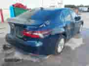 2021 Toyota Camry LE with VIN 4T1C11AK2MU534448, listed as a IAAI auction lot 43111658 with 89,877 mi miles and . Bid and sale history available at DreamBid. Image 4.