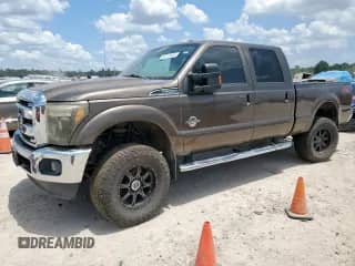 2015 Ford F-250 Lariat с VIN 1FT7W2BT0FED66942, выставлен на аукционе Copart как лот 66212645 с пробегом 157 518 миль миль и Списание • Salvage title. История ставок и продаж доступна на DreamBid. Изображение 1.