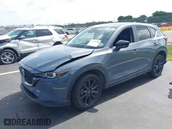 2023 Mazda CX-5 S Carbon Edition z VIN JM3KFBCM6P0171807, wystawiony jako IAAI lot #42450088 z przebiegiem 40 146 mil mil oraz . Historia ofert i sprzedaży dostępna na DreamBid. Obrazek 2.
