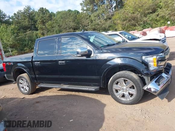 2018 Ford F-150 XL z VIN 1FTEW1EG1JFE55731, wystawiony jako IAAI lot #43173595 z przebiegiem 221 401 mil mil oraz . Historia ofert i sprzedaży dostępna na DreamBid. Obrazek 13.