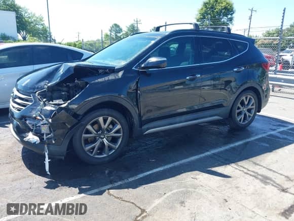 2018 Hyundai Santa Fe Ultimate with VIN 5NMZW4LA4JH054307, listed as a IAAI auction lot 42532426 with 148,299 mi miles and . Bid and sale history available at DreamBid. Image 2.