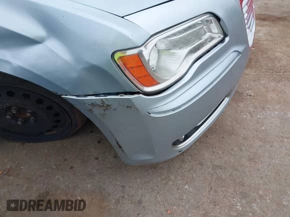 2013 Chrysler 300 with VIN 2C3CCAAGXDH707697, listed as a IAAI auction lot 42315349 with Not provided miles and . Bid and sale history available at DreamBid. Image 14.