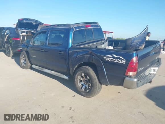 2005 Toyota Tacoma PreRunner with VIN 3TMJU62N75M004880, listed as a IAAI auction lot 43383822 with 198,672 mi miles and . Bid and sale history available at DreamBid. Image 3.