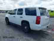 2013 Chevrolet Tahoe Commercial z VIN 1GNLC2E05DR327981, wystawiony jako IAAI lot #42835627 z przebiegiem 164 099 mil mil oraz . Historia ofert i sprzedaży dostępna na DreamBid. Obrazek 3.