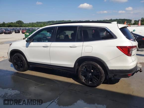 2021 Honda Pilot Special Edition with VIN 5FNYF6H20MB085259, listed as a Copart auction lot 63287095 with 61,271 mi miles and Salvage title. Bid and sale history available at DreamBid. Image 2.