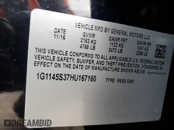 2017 Chevrolet Impala Premier z VIN 1G1145S37HU167160, wystawiony jako Copart lot #69737465 z przebiegiem 88 335 mil mil oraz Szkoda całkowita • Salvage title. Historia ofert i sprzedaży dostępna na DreamBid. Obrazek 13.