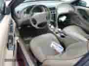 2004 Ford Mustang Deluxe z VIN 1FAFP44484F115156, wystawiony jako Copart lot #75246024 z przebiegiem Nie podano mil oraz Nie do naprawy • Non repairable. Historia ofert i sprzedaży dostępna na DreamBid. Obrazek 8.