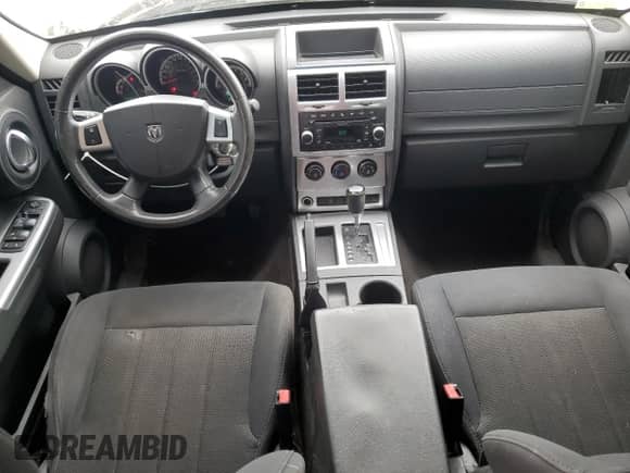 2011 Dodge Nitro SXT с VIN 1D4PT5GK4BW575747, выставлен на аукционе Copart как лот 80029535 с пробегом 162 176 миль миль и Списание • Salvage title. История ставок и продаж доступна на DreamBid. Изображение 8.