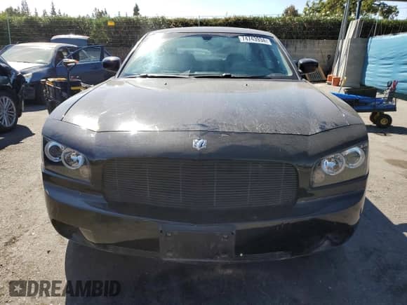 2010 Dodge Charger SXT z VIN 2B3CA3CV9AH210274, wystawiony jako Copart lot #74743934 z przebiegiem 182 675 mil mil oraz Szkoda całkowita • Salvage title. Historia ofert i sprzedaży dostępna na DreamBid. Obrazek 5.