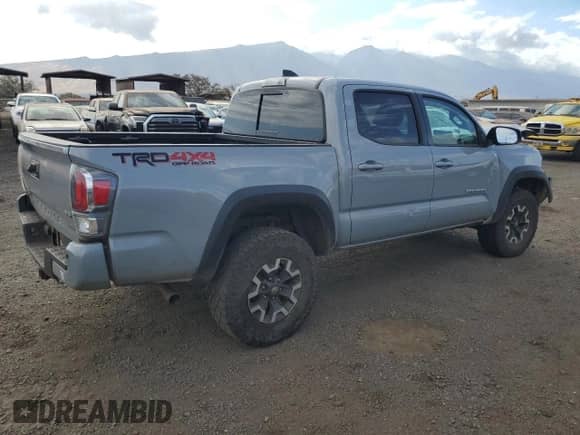 2020 Toyota Tacoma SR5 with VIN 5TFCZ5AN2LX216308, listed as a Copart auction lot 69860245 with 58,698 mi miles and Salvage title. Bid and sale history available at DreamBid. Image 3.