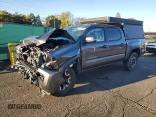 2020 Toyota Tacoma TRD Off Road with VIN 5TFCZ5AN0LX215240, listed as a Copart auction lot 84038445 with 88,962 mi miles and Salvage title. Bid and sale history available at DreamBid. Image 1.
