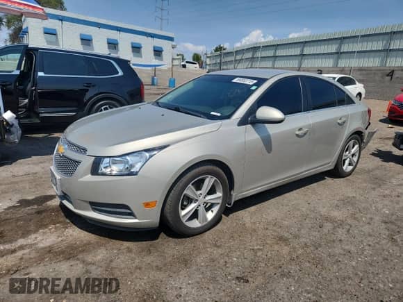 2014 Chevrolet Cruze 2LT с VIN 1G1PE5SB2E7256367, выставлен на аукционе Copart как лот 69853715 с пробегом 129 500 миль миль и Списание • Salvage title. История ставок и продаж доступна на DreamBid. Изображение 1.