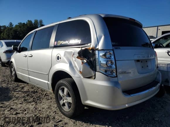 2012 Dodge Grand Caravan SXT with VIN 2C4RDGCG2CR394687, listed as a Copart auction lot 84749475 with 122,989 mi miles and Clean title. Bid and sale history available at DreamBid. Image 2.