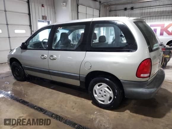 2000 Dodge Caravan SE with VIN 2B4GP45G7YR822770, listed as a Copart auction lot 86096444 with 128,592 mi miles and Salvage title. Bid and sale history available at DreamBid. Image 2.