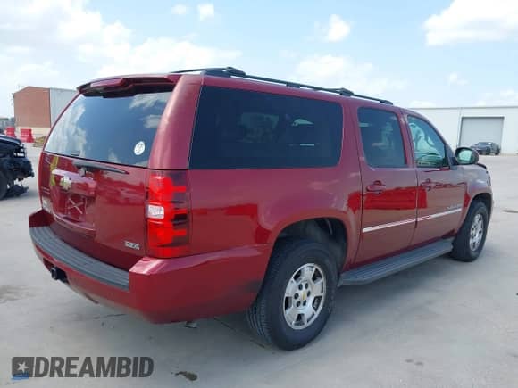 2010 Chevrolet Suburban LT z VIN 1GNUCJE03AR267838, wystawiony jako IAAI lot #42535623 z przebiegiem 265 769 mil mil oraz . Historia ofert i sprzedaży dostępna na DreamBid. Obrazek 4.