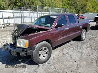 2005 Dodge Dakota с VIN 1D3HW48N95S129026, выставлен на аукционе Copart как лот 74182814 с пробегом 114 506 миль миль и Списание • Salvage title. История ставок и продаж доступна на DreamBid. Изображение 1.