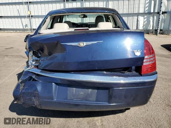 2005 Chrysler 300 C with VIN 2C3JA63H85H679092, listed as a Copart auction lot 70284705 with 191,335 mi miles and Salvage title. Bid and sale history available at DreamBid. Image 6.