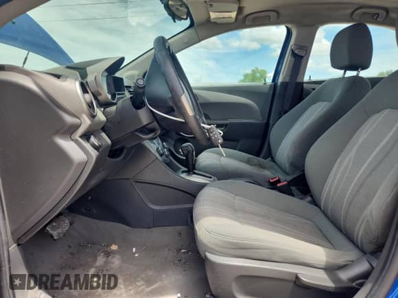 2016 Chevrolet Sonic LT with VIN 1G1JC5SH0G4182211, listed as a Copart auction lot 63282435 with 114,374 mi miles and Salvage title. Bid and sale history available at DreamBid. Image 7.