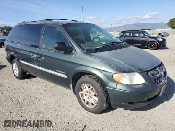 2001 Dodge Caravan SE with VIN 2B4GP44G51R133625, listed as a Copart auction lot 57094385 with 183,069 mi miles and Clean title. Bid and sale history available at DreamBid. Image 4.