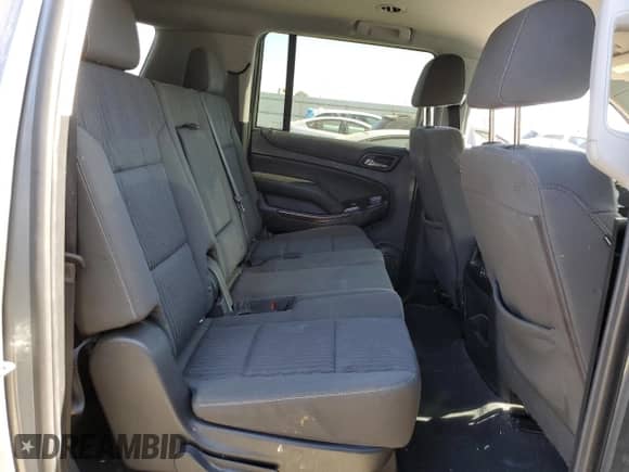 2019 Chevrolet Suburban LS with VIN 1GNSCGKC6KR209877, listed as a Copart auction lot 77125534 with 67,591 mi miles and Salvage title. Bid and sale history available at DreamBid. Image 11.