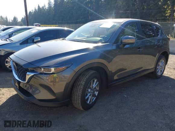2023 Mazda CX-5 S Carbon Edition z VIN JM3KFBCM6P0143148, wystawiony jako IAAI lot #43382486 z przebiegiem 22 099 mil mil oraz . Historia ofert i sprzedaży dostępna na DreamBid. Obrazek 17.