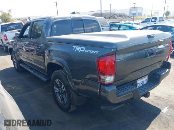 2016 Toyota Tacoma SR5 with VIN 3TMAZ5CNXGM009360, listed as a IAAI auction lot 43186084 with 89,490 mi miles and . Bid and sale history available at DreamBid. Image 3.