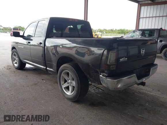 2011 Ram 1500 ST with VIN 1D7RB1GP6BS560838, listed as a IAAI auction lot 43150529 with 224,979 mi miles and . Bid and sale history available at DreamBid. Image 3.