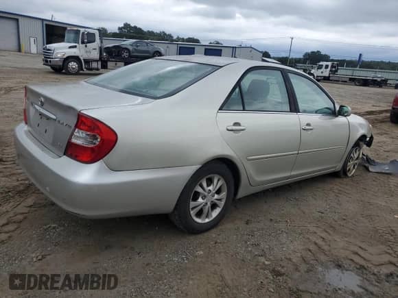 2004 Toyota Camry XLE с VIN 4T1BF30K54U571522, выставлен на аукционе Copart как лот 81809265 с пробегом 179 334 миль миль и Списание • Salvage title. История ставок и продаж доступна на DreamBid. Изображение 3.