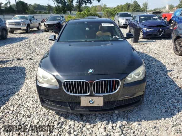2013 BMW 7 Series 750i с VIN WBAYA8C51DC996710, выставлен на аукционе Copart как лот 69549145 с пробегом 158 580 миль миль и Чистый • Clean title. История ставок и продаж доступна на DreamBid. Изображение 5.