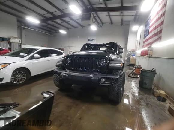 2023 Jeep Wrangler Sport Altitude с VIN 1C4HJXDG6PW635120, выставлен на аукционе Copart как лот 77864744 с пробегом 31 830 миль миль и Списание • Salvage title. История ставок и продаж доступна на DreamBid. Изображение 14.