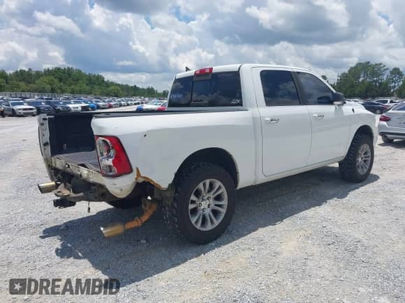 2014 Ram 1500 Big Horn z VIN 1C6RR7LT4ES270816, wystawiony jako IAAI lot #42396422 z przebiegiem 167 919 mil mil oraz . Historia ofert i sprzedaży dostępna na DreamBid. Obrazek 4.