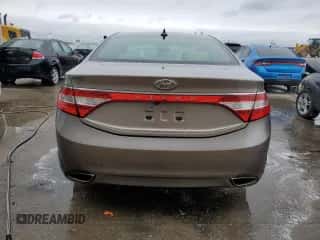 2013 Hyundai Azera с VIN KMHFG4JG0DA288574, выставлен на аукционе Copart как лот 83459544 с пробегом 179 327 миль миль и Списание • Salvage title. История ставок и продаж доступна на DreamBid. Изображение 6.