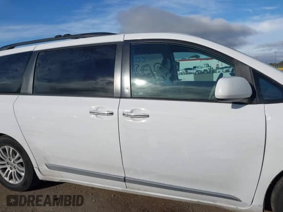 2013 Toyota Sienna XLE AAS with VIN 5TDYK3DC8DS324853, listed as a IAAI auction lot 41647704 with 143,656 mi miles and . Bid and sale history available at DreamBid. Image 13.