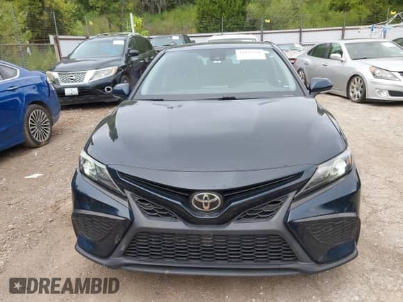2021 Toyota Camry SE Nightshade z VIN 4T1T11AK9MU430894, wystawiony jako IAAI lot #43127250 z przebiegiem 80 059 mil mil oraz . Historia ofert i sprzedaży dostępna na DreamBid. Obrazek 12.
