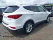 2017 Hyundai Santa Fe 2.0T with VIN 5NMZUDLA9HH046283, listed as a IAAI auction lot 42016725 with 119,209 mi miles and . Bid and sale history available at DreamBid. Image 4.